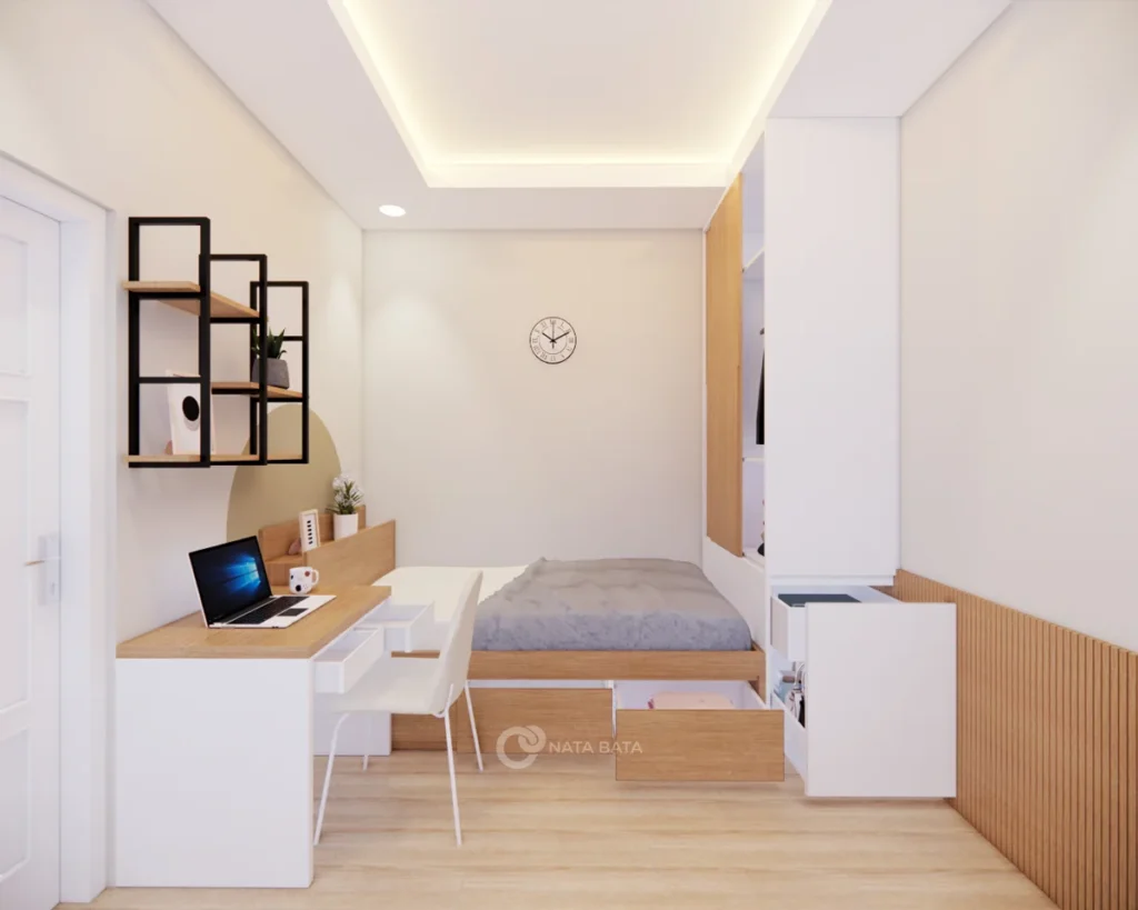 Kamar kos dengan ranjang laci tarik, meja belajar, dan lemari pakaian built-in